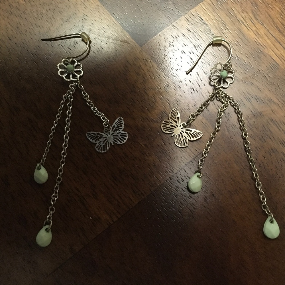 Green and silver tone dangle earrings